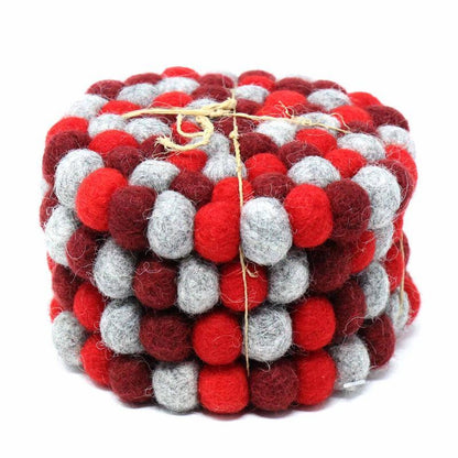 This Global Groove Life, handmade, ethical, fair trade, eco-friendly, sustainable, felt Chakra Reds coaster set was created by artisans in Kathmandu Nepal and will bring colorful warmth and functionality to your table top.