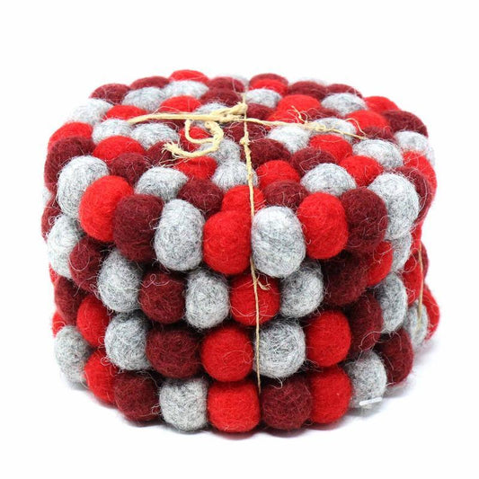This Global Groove Life, handmade, ethical, fair trade, eco-friendly, sustainable, felt Chakra Reds coaster set was created by artisans in Kathmandu Nepal and will bring colorful warmth and functionality to your table top.