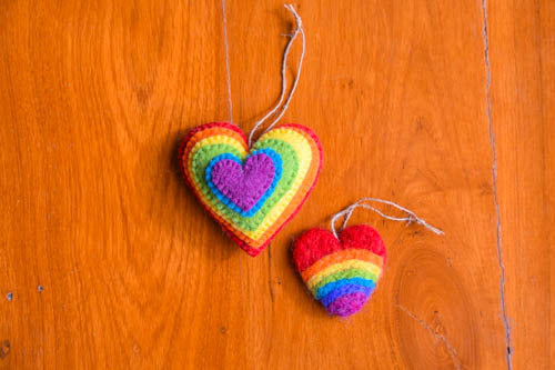 This Global Groove Life, handmade, ethical, fair trade, eco-friendly, sustainable, Rainbow Love Burst heart and small rainbow heart felt ornament set was created by artisans in Kathmandu Nepal and will bring colorful warmth and fun to your Christmas tree this season.